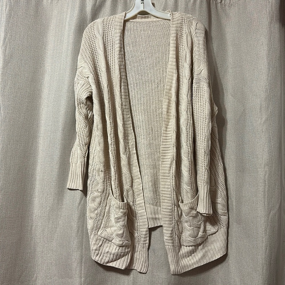 Knitted cream sweater